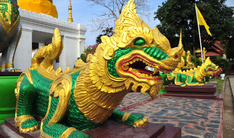 singha statue at temple bangkok thailand asia