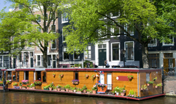 Houseboat along the canal - Amsterdam, Netherlands