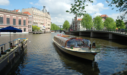 Houseboat along the canal - Amsterdam, Netherlands