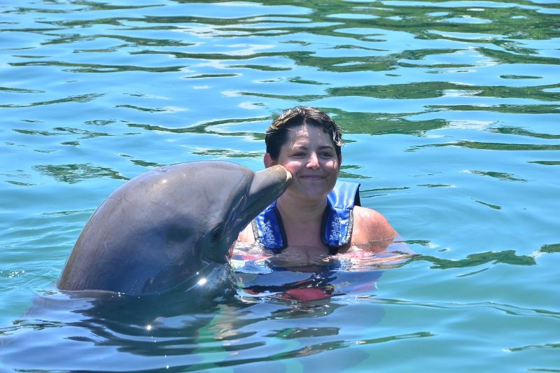 Swimming at Xelha with flipper the friendly dolphin.  An all-inclusive aquatic theme park that is fun for guests of all ages.